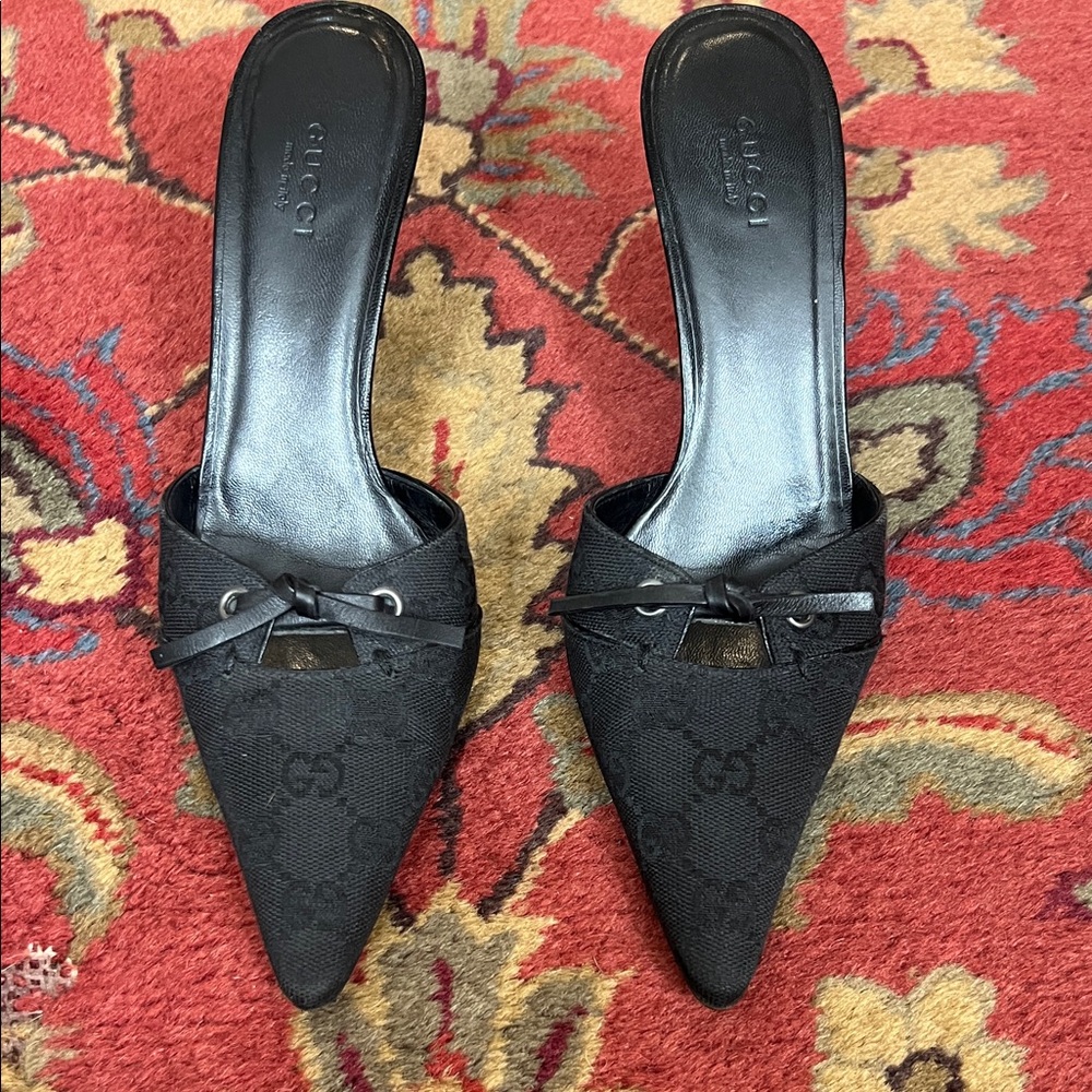 Authentic Gucci GG canvas heels size 7B.
